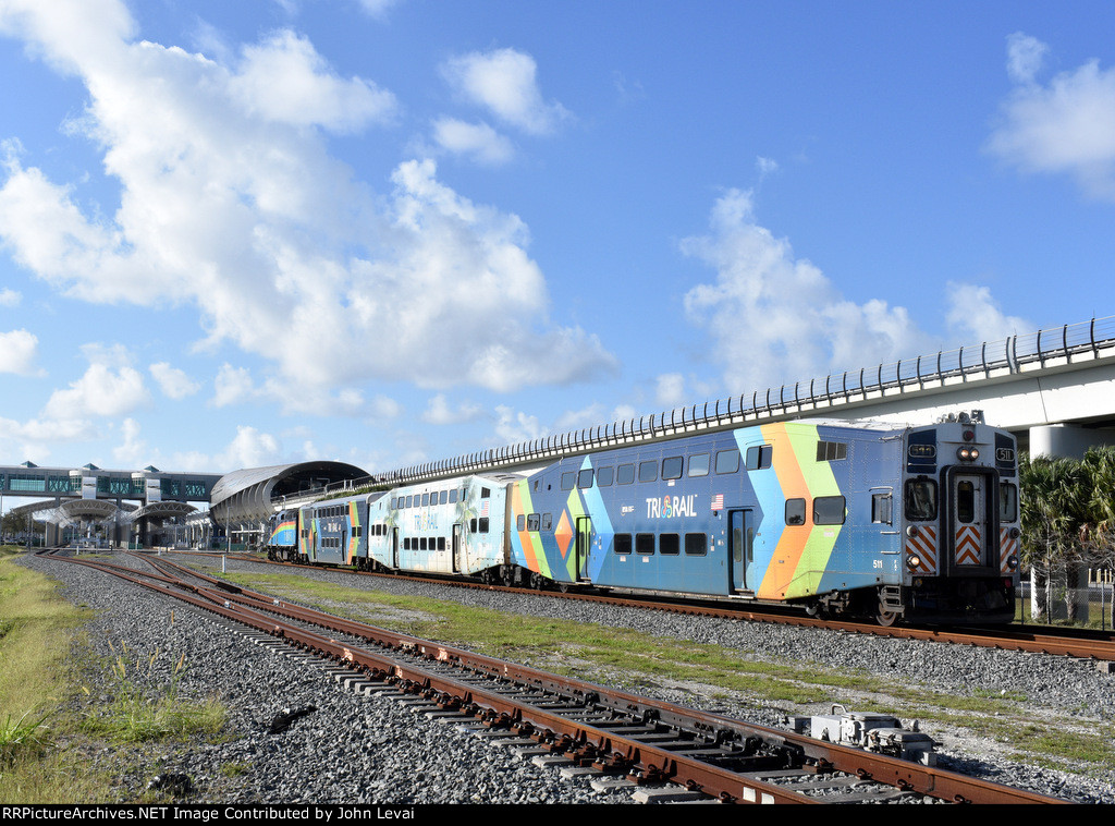 Northbound Tri-Rail Train # P668 leaves the Miami Airport Station behind in the very beginning of its journey to Magonia Park 